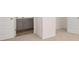 Bedroom with carpet and bathroom across the hall at 1949 Van Allen Ct, Dacula, GA 30019