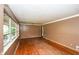 Spacious living room with hardwood floors, plenty of natural light, and a neutral color palette at 3179 Dogwood Dr, Atlanta, GA 30344