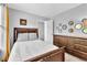 Comfortable bedroom with stylish decor, warm lighting, and modern furniture at 3358 North Ct, Ellenwood, GA 30294