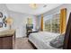 Cozy bedroom featuring natural light, soft carpet, and fresh decor at 3358 North Ct, Ellenwood, GA 30294