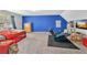 Large bonus room with cozy recliner, perfect for relaxing or entertaining guests at 3358 North Ct, Ellenwood, GA 30294