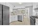 Well-lit kitchen with stainless steel appliances, bay window, and a view to the backyard at 3358 North Ct, Ellenwood, GA 30294