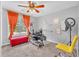 Bedroom/office with a ceiling fan, window, and desk with computer at 3358 North Ct, Ellenwood, GA 30294