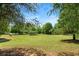 Expansive green space with mature trees, gazebo and park bench at 554 Rendevous Rd, Acworth, GA 30102