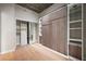 Bedroom with a murphy bed and closet with mirrored doors at 855 Peachtree Ne St # 3205, Atlanta, GA 30308