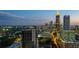 Dramatic city view with illuminated skyscrapers during evening twilight at 855 Peachtree Ne St # 3205, Atlanta, GA 30308