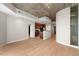 Open-concept living room and kitchen area with modern finishes and hardwood floors throughout at 855 Peachtree Ne St # 3205, Atlanta, GA 30308