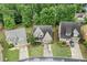 Aerial view of the house highlighting curb appeal and neighborhood setting at 1839 Tranquil Field Nw Dr, Acworth, GA 30102