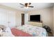This bedroom features neutral walls, carpet, and bright natural light from the window at 1839 Tranquil Field Nw Dr, Acworth, GA 30102