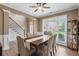 Elegant dining room featuring hardwood floors, natural light, and stylish décor at 1839 Tranquil Field Nw Dr, Acworth, GA 30102