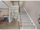Grand two-story foyer with a staircase at 1839 Tranquil Field Nw Dr, Acworth, GA 30102