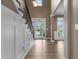 Inviting entryway with beautiful hardwood floors and natural light at 1839 Tranquil Field Nw Dr, Acworth, GA 30102