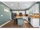 Modern kitchen with stainless steel appliances, granite countertops, and a center island at 1839 Tranquil Field Nw Dr, Acworth, GA 30102