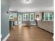 Open-concept living space with dining area and seating at 1839 Tranquil Field Nw Dr, Acworth, GA 30102