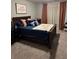 Comfortable bedroom featuring a king-size bed and matching decor at 2709 Ratby Ne Ln, Conyers, GA 30013