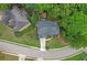 A lovely home has a well manicured yard, tall shade trees, and a cozy outdoor gazebo at 3310 Vista Creek Dr, Dacula, GA 30019