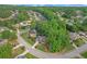 A residential neighborhood with mature trees, manicured lawns, and sidewalks at 3310 Vista Creek Dr, Dacula, GA 30019