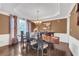 Formal dining room with tray ceilings, elegant chandelier, and stylish furnishings at 3310 Vista Creek Dr, Dacula, GA 30019