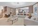 Bright and airy living room with an open floor plan, neutral tones, and recessed lighting at 3310 Vista Creek Dr, Dacula, GA 30019
