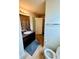 Full bathroom features a vanity with granite countertop and tiled floors at 5848 Rex Ridge Loop, Rex, GA 30273
