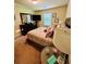 Cozy bedroom with a queen bed and a dark dresser at 5848 Rex Ridge Loop, Rex, GA 30273
