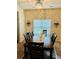 Cozy dining room with wooden table, seating for six, and elegant chandelier lighting at 5848 Rex Ridge Loop, Rex, GA 30273