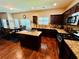 Modern kitchen with granite countertops, stainless steel appliances, and hardwood floors at 5848 Rex Ridge Loop, Rex, GA 30273