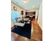 Open-concept kitchen and dining area with modern appliances and a large dining table at 5848 Rex Ridge Loop, Rex, GA 30273