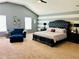 Spacious main bedroom suite featuring a vaulted ceiling and decor at 5848 Rex Ridge Loop, Rex, GA 30273