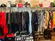 Well-organized walk-in closet with multiple shelves and hanging rods for clothing and accessories, great storage at 5848 Rex Ridge Loop, Rex, GA 30273