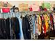 Well-organized walk-in closet featuring multiple shelves and hanging rods for clothing and accessories, great storage at 5848 Rex Ridge Loop, Rex, GA 30273