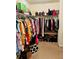 Spacious walk-in closet with ample storage, shelving, and hanging space, ensuring an organized wardrobe and shoe collection at 5848 Rex Ridge Loop, Rex, GA 30273