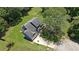 Aerial view of a home with a spacious backyard and a two-car garage at 2505 Se Tiffany Ct, Conyers, GA 30013