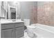 Bathroom with tub and shower combo, single sink and neutral paint at 2505 Se Tiffany Ct, Conyers, GA 30013