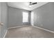 Bedroom with neutral carpet and ceiling fan at 2505 Se Tiffany Ct, Conyers, GA 30013