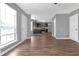 Open-concept living area showcases the kitchen, dining area, and lots of natural light at 2505 Se Tiffany Ct, Conyers, GA 30013