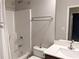 Clean, well-lit bathroom featuring a shower-tub combo and a modern vanity at 2508 Norwood Park Xing, Atlanta, GA 30340
