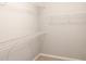Walk-in closet with wire shelving and neutral walls, ready to be organized to your liking at 2508 Norwood Park Xing, Atlanta, GA 30340