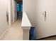 Second floor hallway with carpet and neutral walls with a view to a second floor bedroom at 2508 Norwood Park Xing, Atlanta, GA 30340