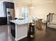 Modern kitchen with stainless steel appliances, granite countertops, and a breakfast bar at 2508 Norwood Park Xing, Atlanta, GA 30340