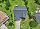 Overhead view of the property featuring well-maintained lawn and beautiful landscaping at 347 Cobblestone Court, Hampton, GA 30228