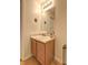 Bright bathroom featuring a single vanity and decorative accents at 347 Cobblestone Court, Hampton, GA 30228