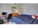 Bright bedroom featuring natural light, a desk area, and comfortable furnishings at 347 Cobblestone Court, Hampton, GA 30228