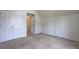 Bedroom featuring neutral carpet, and walk-in closet at 347 Cobblestone Court, Hampton, GA 30228