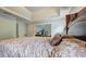 Spacious main bedroom featuring a tray ceiling and decorative furnishings at 347 Cobblestone Court, Hampton, GA 30228