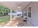 Exterior shot showcasing the covered patio and backyard at 911 Sonoma Dr, Lawrenceville, GA 30045