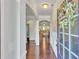 Inviting foyer with hardwood floors, arched entryways, and a view into the spacious living area at 911 Sonoma Dr, Lawrenceville, GA 30045
