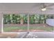 Covered patio with serene views of the backyard at 911 Sonoma Dr, Lawrenceville, GA 30045
