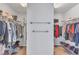 Spacious walk-in closet with clothing racks and shelves at 911 Sonoma Dr, Lawrenceville, GA 30045
