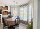 Cozy breakfast nook with bright windows and decorative accents for a charming ambiance at 3484 Lynley Mill Ln, Dacula, GA 30019
